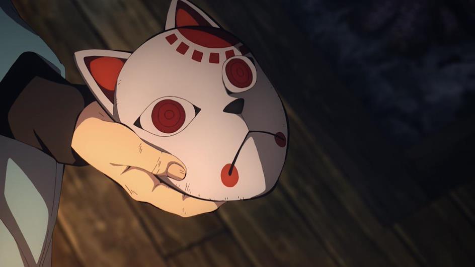 Tanjiro holding up ceremonial mask