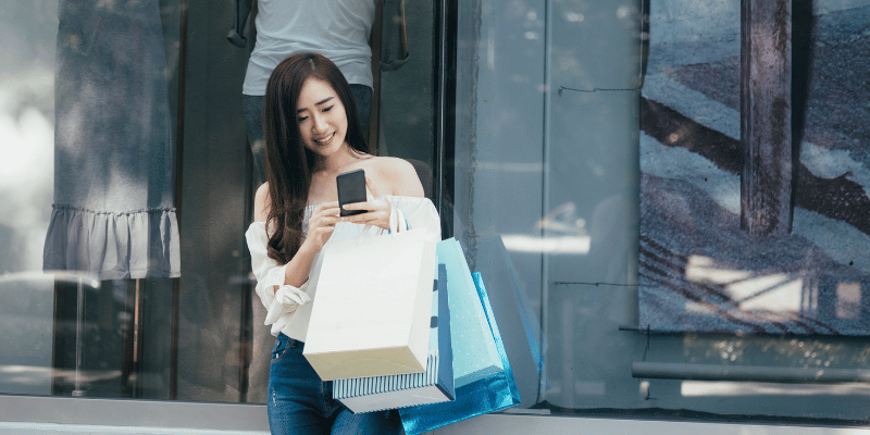 woman at a japanese hand bag store