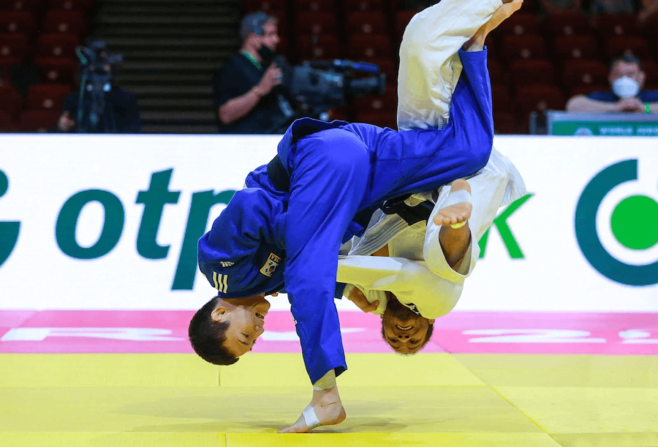 A judoka attempts to slam his opponent to the ground in a competitive judo match. Photo Courtesy of IJF.org