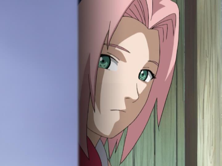 Sakura Haruno mirando fijamente detras de una pared