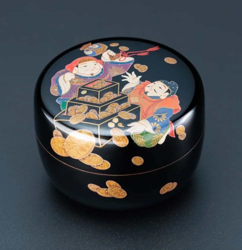 Japanese urushi teaware with flamboyant decorative motifs